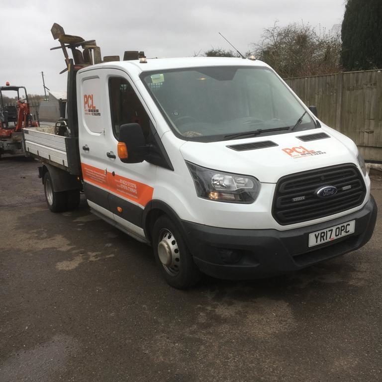 company van with equipment in the back of it